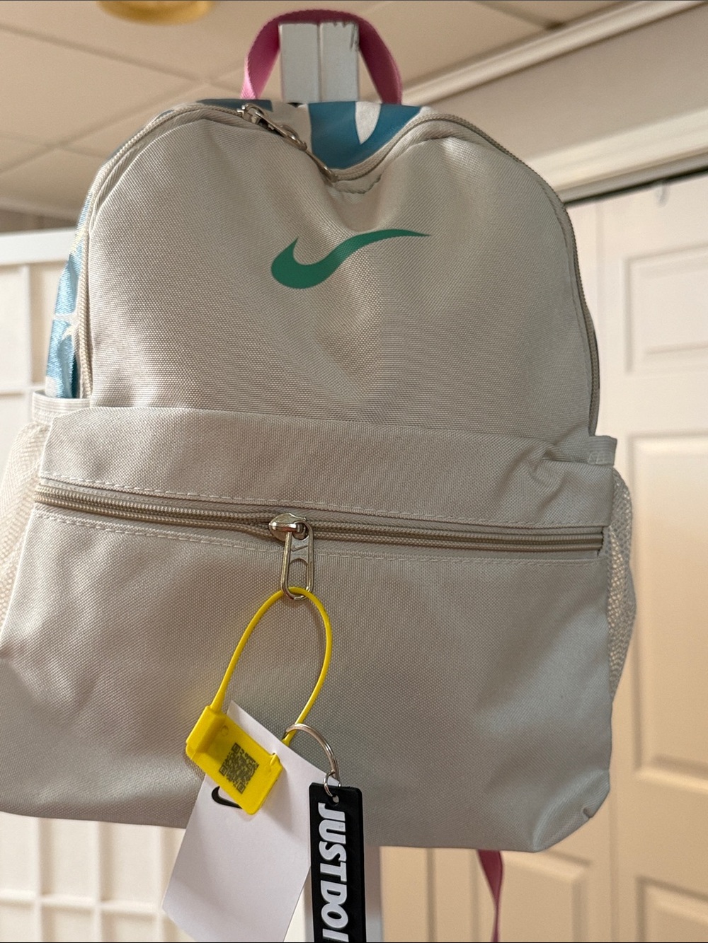 Nike Cream Canvas Backpack with Teal Swoosh and Pink Handle